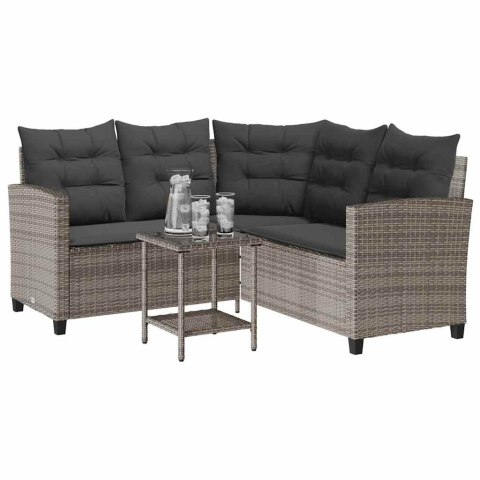 Sofa ogrodowa ze stołem i poduszkami w kształcie litery L